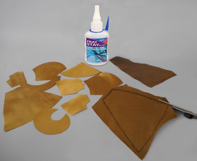 Neatly cut Edwardian outfit pattern pieces with clean, fray-free edges
